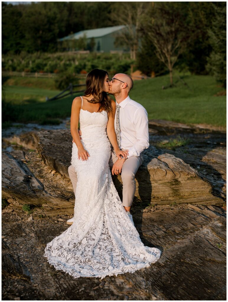 bride and groom share kiss at golden hour at New Jersey wedding venue