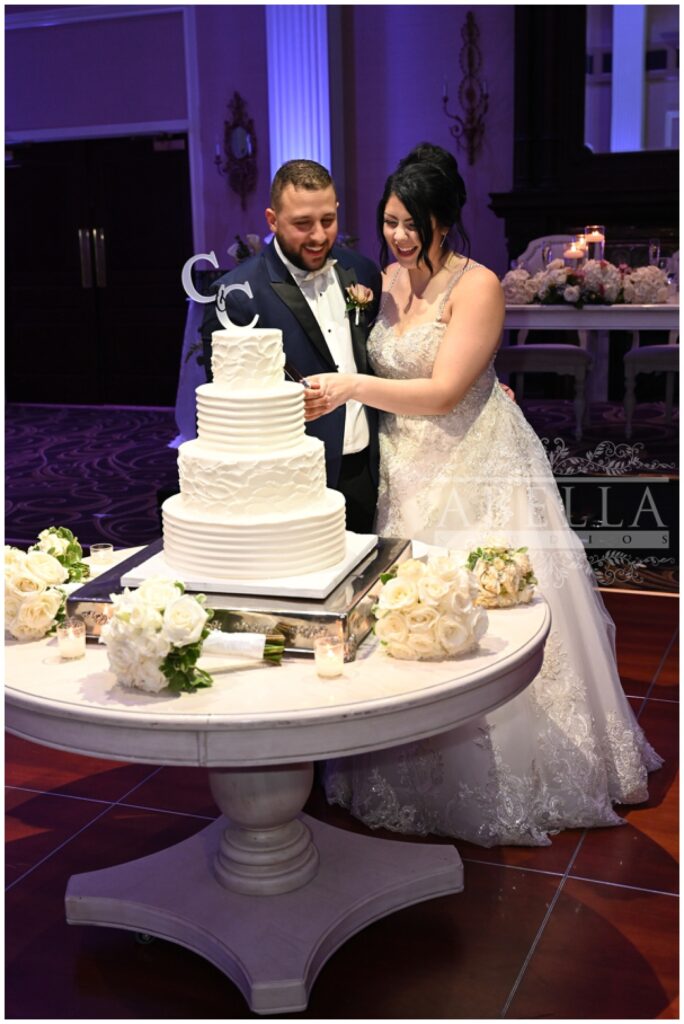 bride and groom cutting their cake at their reception in Somerset, New Jersey